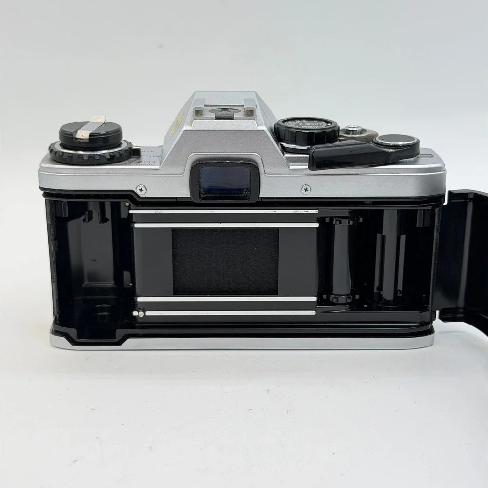 Olympus OM10 35mm Film SLR Camera with Zuiko Auto-S 50mm f1.8 Lens Silver Black